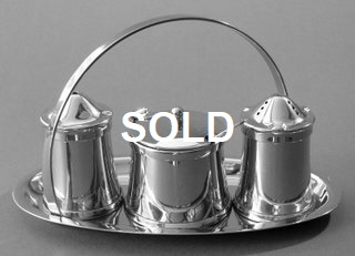 Condiment set on oval tray